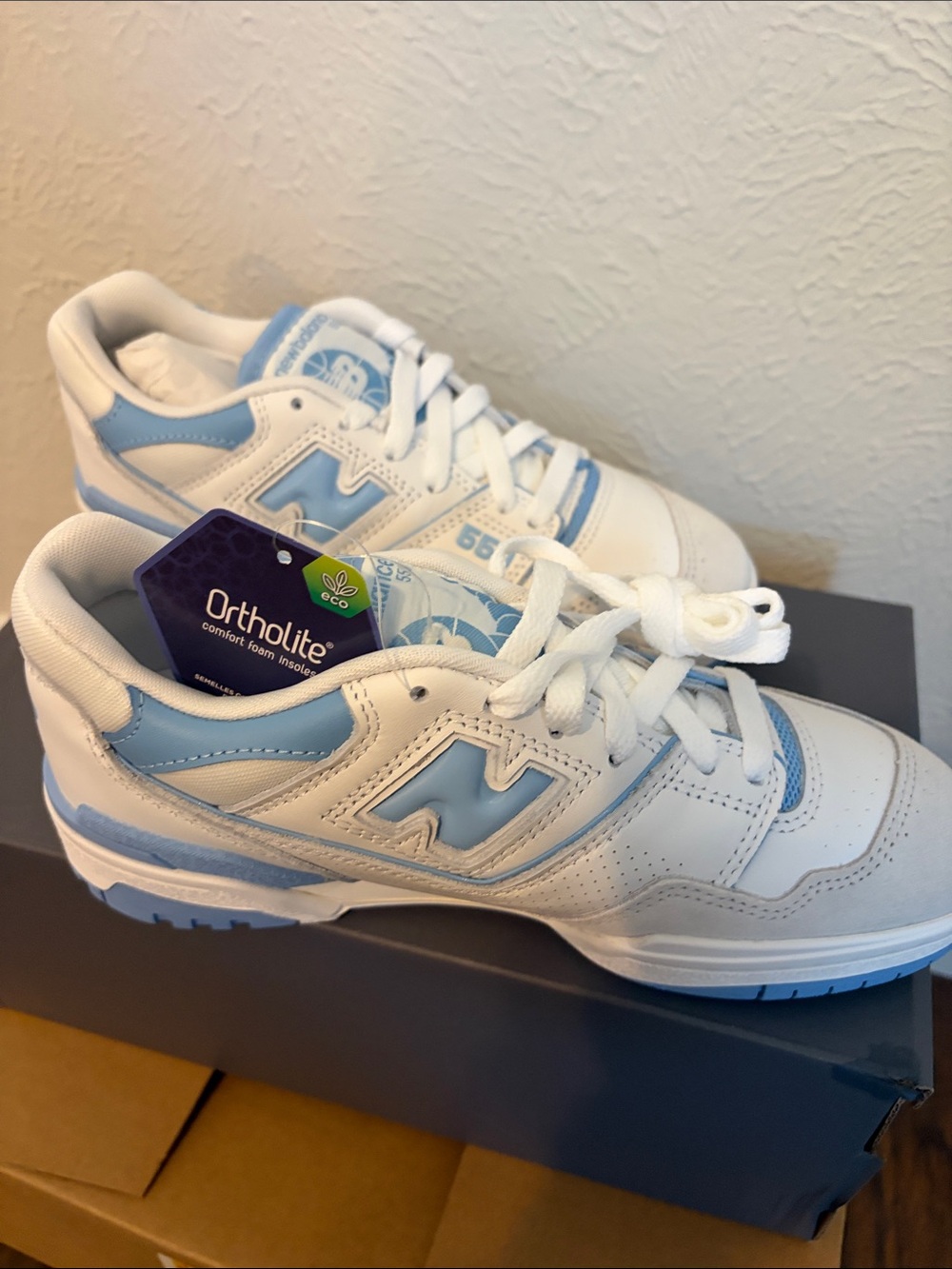 New Balance White and Light Blue Athletic Sneakers